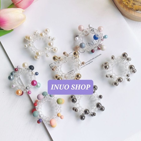 Ligas en forma de espiral con bolas de colores